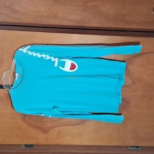 Champion woman's size, medium long sleeve blue T-shirt.